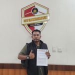 Foto : Ketua DPD Forkorindo Riau, Tp. Batubara saat melaporkan Ke Ditkrimsus Polda Riau pada Selasa (21/07), Siang.