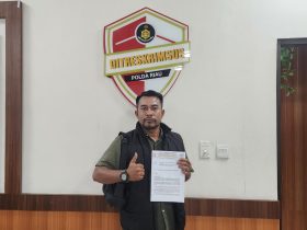 Foto : Ketua DPD Forkorindo Riau, Tp. Batubara saat melaporkan Ke Ditkrimsus Polda Riau pada Selasa (21/07), Siang.